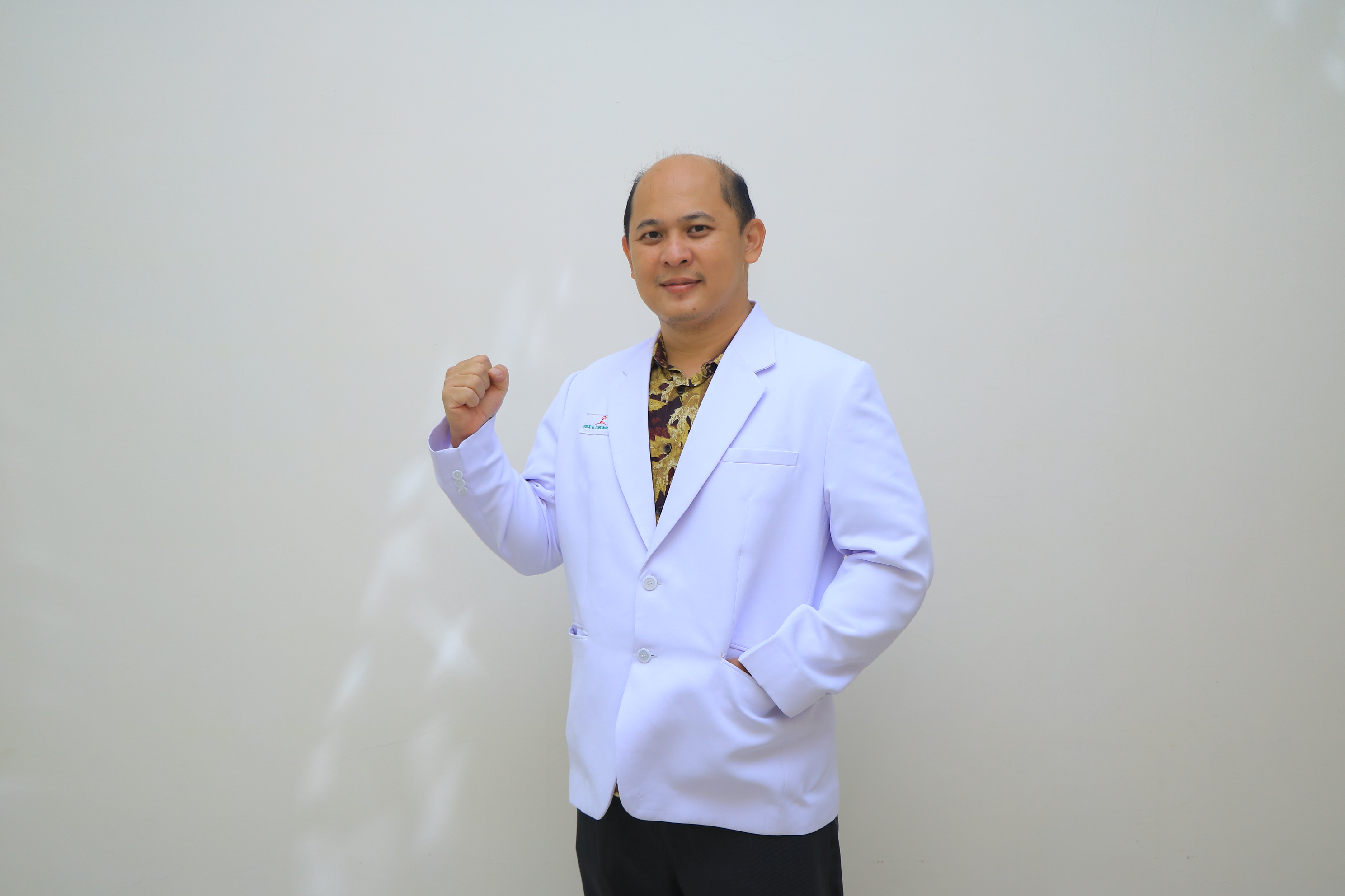 dr. JOHAN GUNADI, Sp.J.P